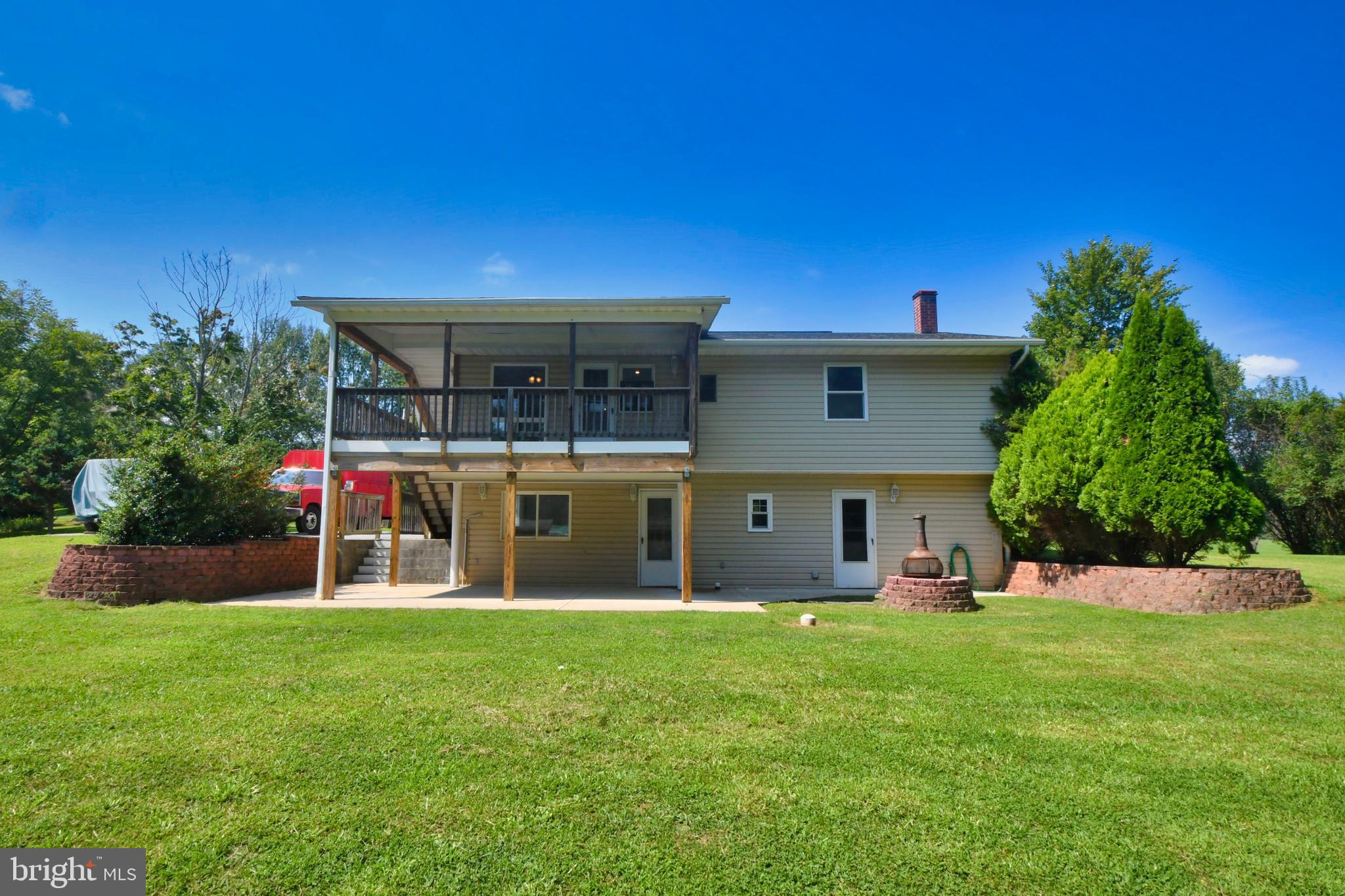 2301 Oakmont Road Fallston, MD 21047 - Photo 3 of 47 Covered deck and spacious patio w/ fire pit