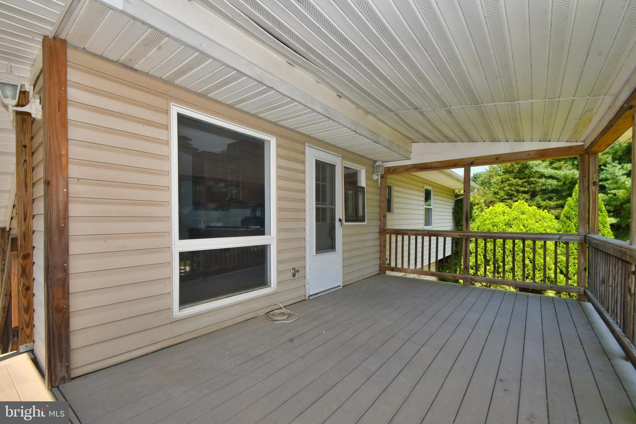 2301 Oakmont Road Fallston, MD 21047 - Photo 8 of 47 Covered deck with walkout from kitchen