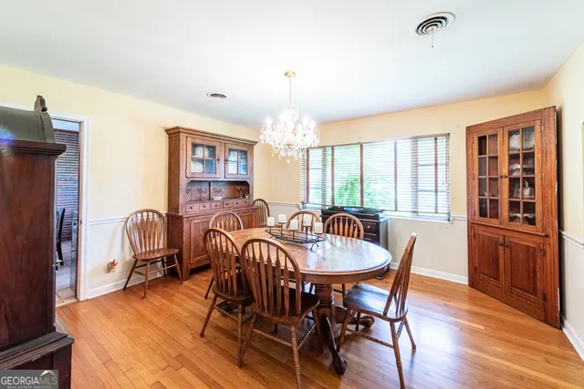 a bathroom with a sink vanity and a mirror