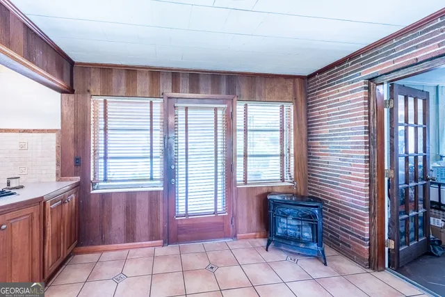 a bedroom with a bed and a book shelf
