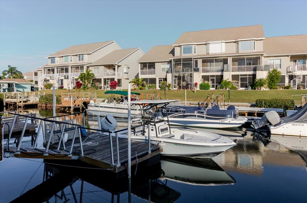 8211 Brent Street, Unit 828 Port Richey, FL 34668 - Photo 31 of 75 a view of a swimming pool with outdoor seating space