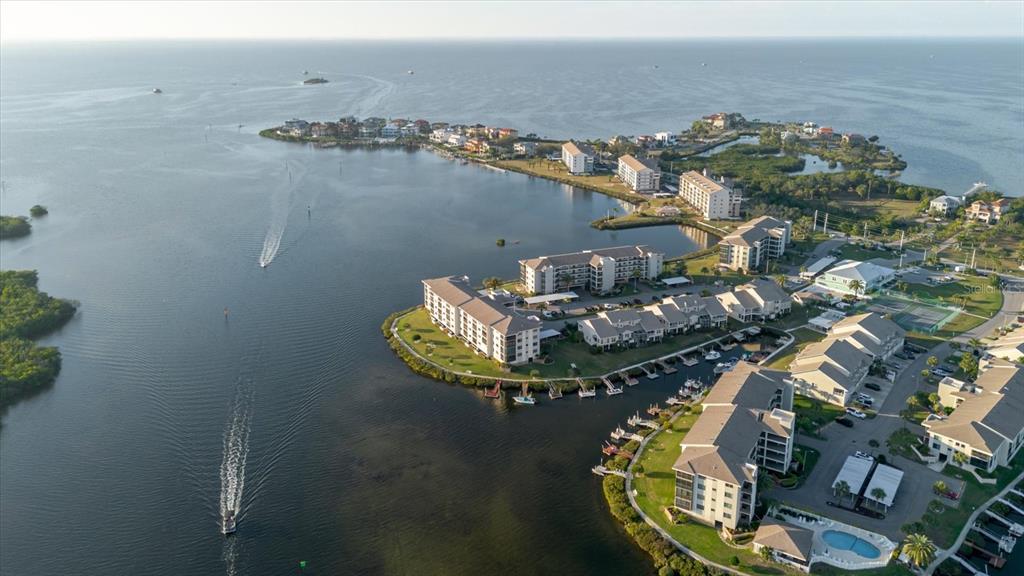 8211 Brent Street, Unit 828 Port Richey, FL 34668 - Photo 40 of 75 an aerial view of a house with outdoor seating