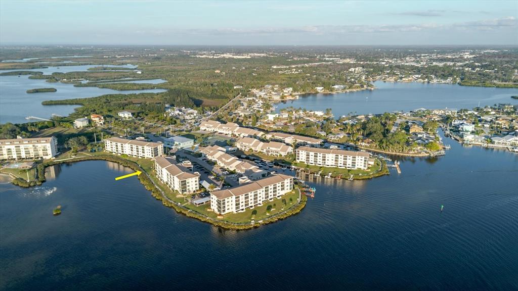 8211 Brent Street, Unit 828 Port Richey, FL 34668 - Photo 43 of 75 an aerial view of ocean residential houses with outdoor space and ocean view