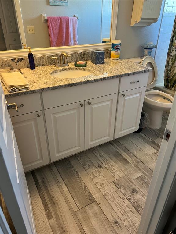 8211 Brent Street, Unit 828 Port Richey, FL 34668 - Photo 73 of 75 a bathroom with a sink and a mirror