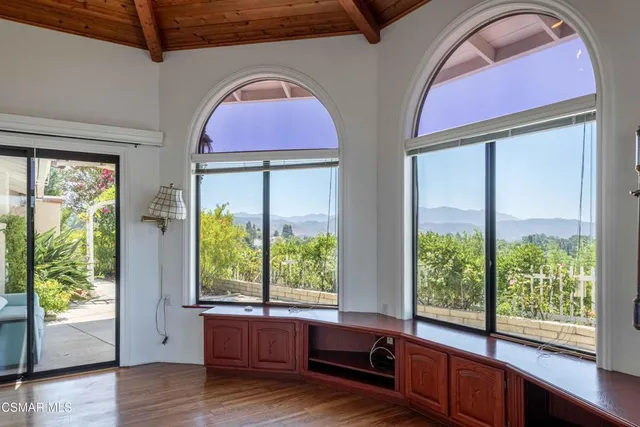 a room with window and wooden floor