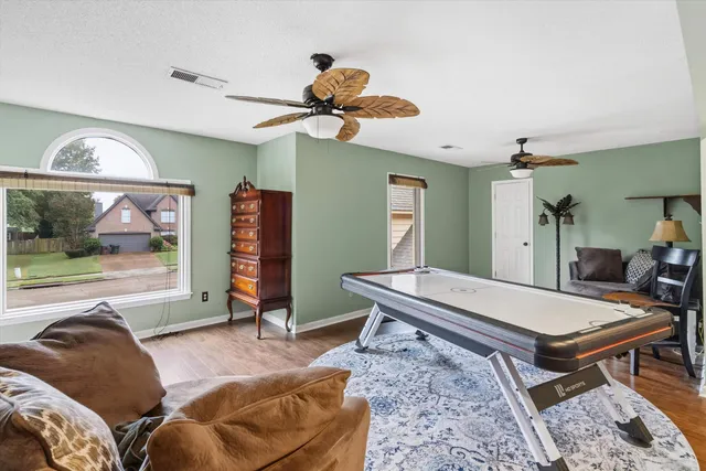 a room with furniture and a chandelier