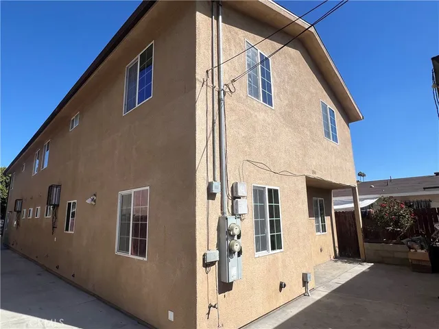 a view of a house with a street