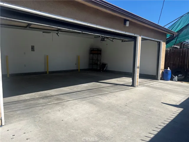an empty room with wooden floor