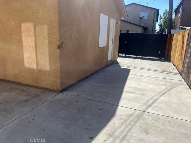 an empty room with wooden floor