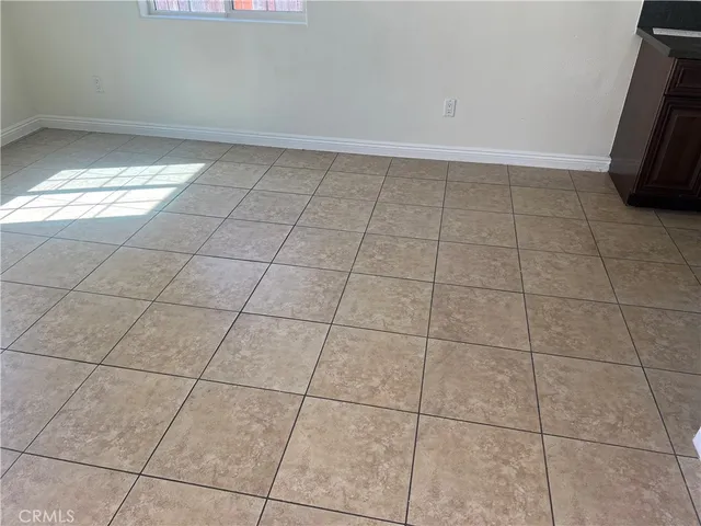 a view of a utility room with windows
