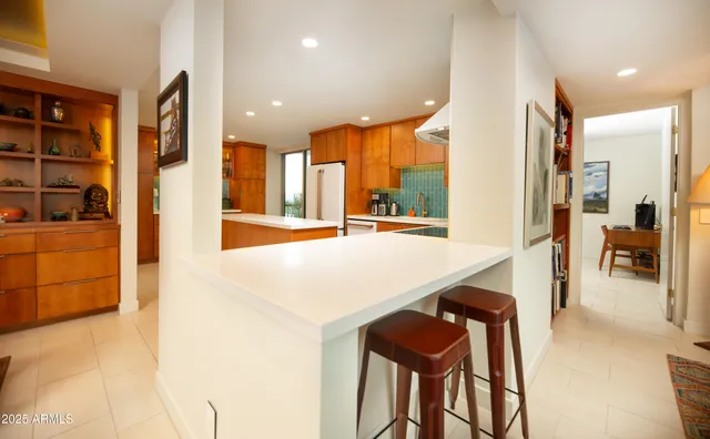 a bedroom with furniture and wooden floor