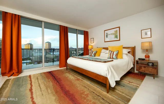 a view of a balcony and chairs