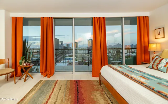 a view of a swimming pool with a lounge chairs