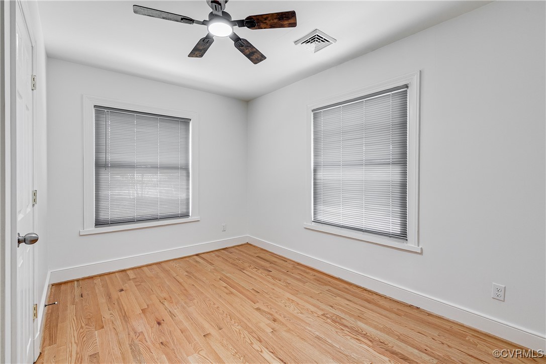 1649 Milo Road Richmond, VA 23225 - Photo 27 of 38 Empty room featuring ceiling fan and wood finished