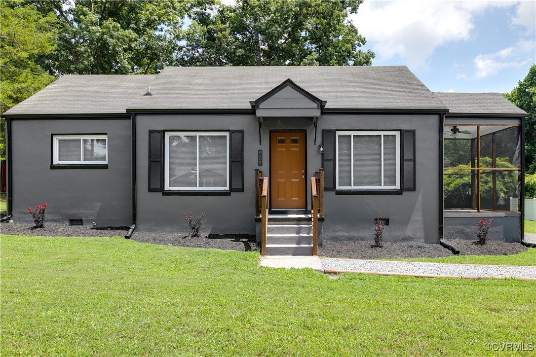 1649 Milo Road Richmond, VA 23225 - Photo 4 of 38 Bungalow-style house with a front lawn, stucco sid