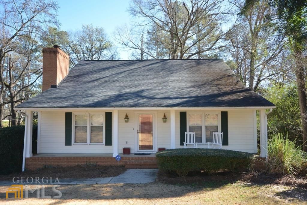 1220 Wood Valley Road Augusta, GA 30909 - Photo 1 of 1 a front view of house with yard and trees around