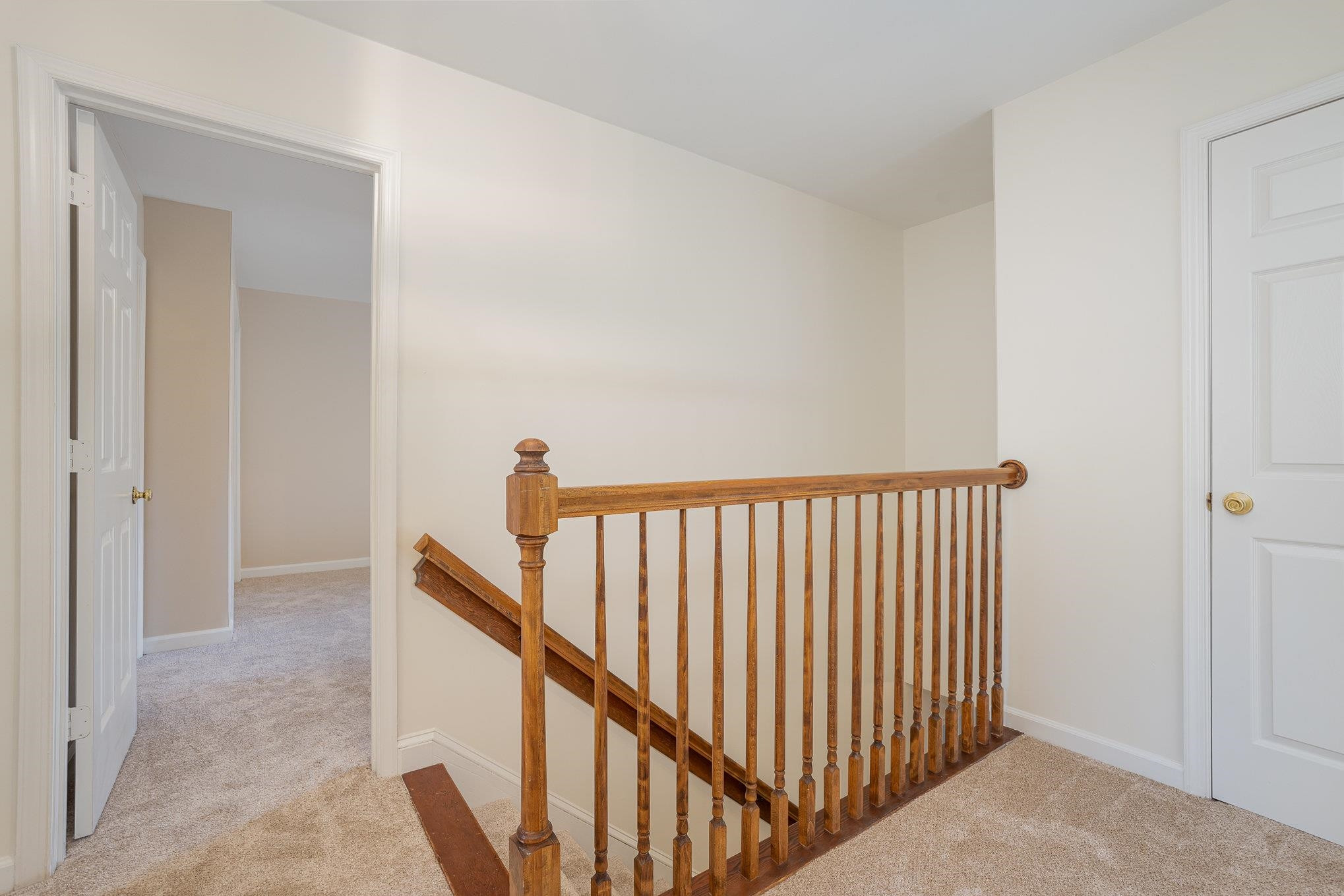 4110 Olde Coach Road Durham, NC 27707 - Photo 13 of 27 a view of a hallway with stairs