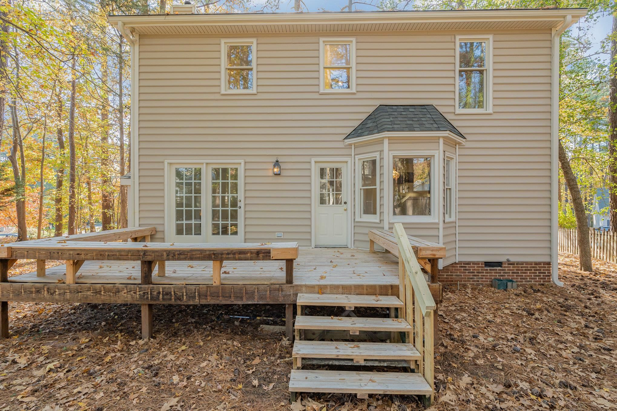 4110 Olde Coach Road Durham, NC 27707 - Photo 23 of 27 a front view of a house with a porch