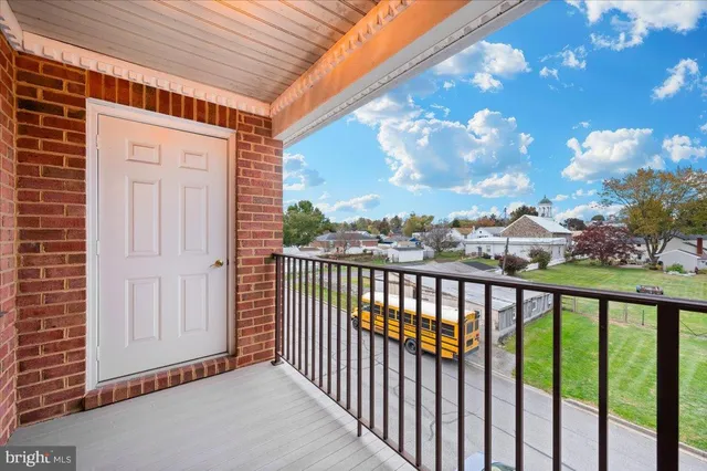 a view of a balcony with an outdoor space