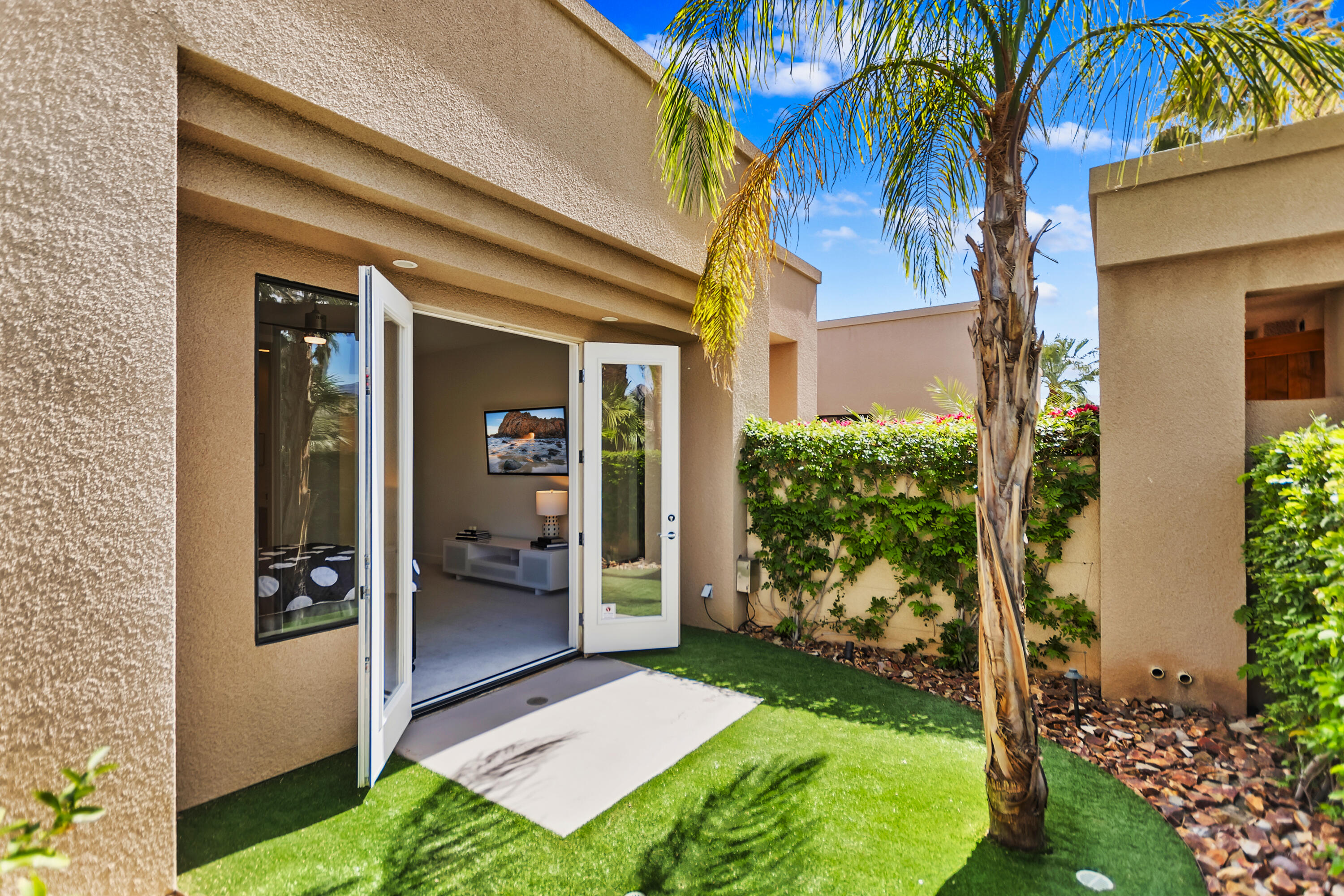 55650 Cherry Hills Drive La Quinta, CA 92253 - Photo 37 of 66 038_Side Patio