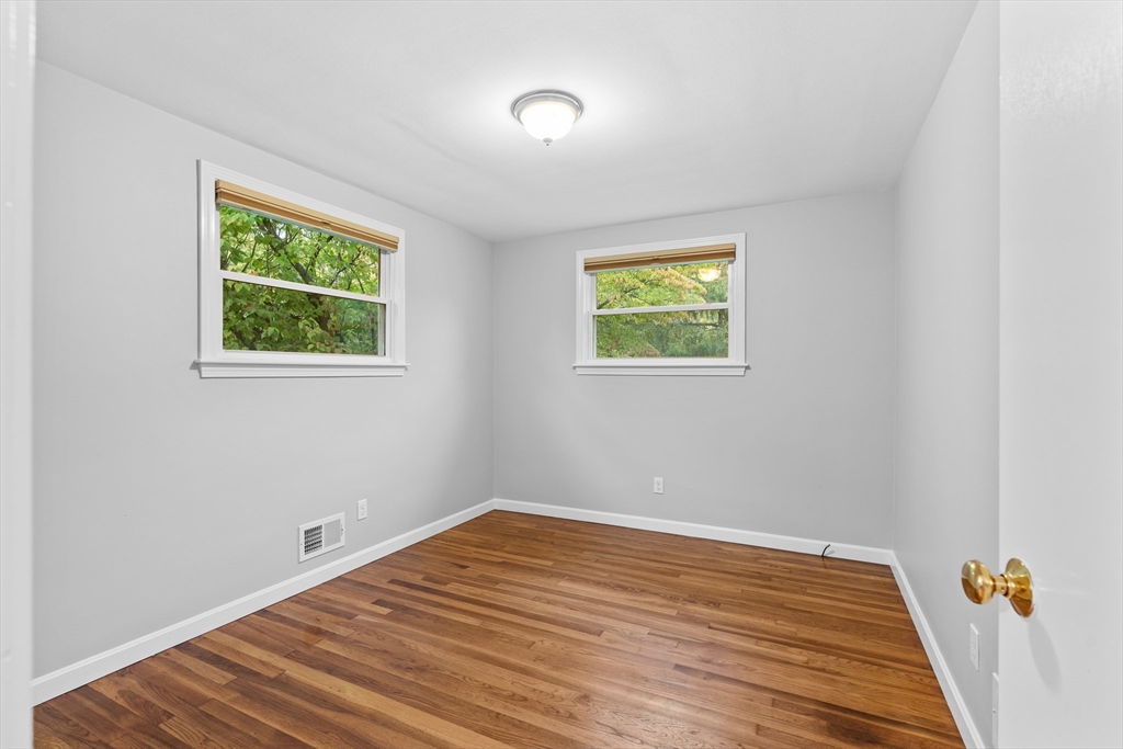 5 Janice Circle Framingham, MA 01701 - Photo 15 of 36 a view of a room with wooden floor and window