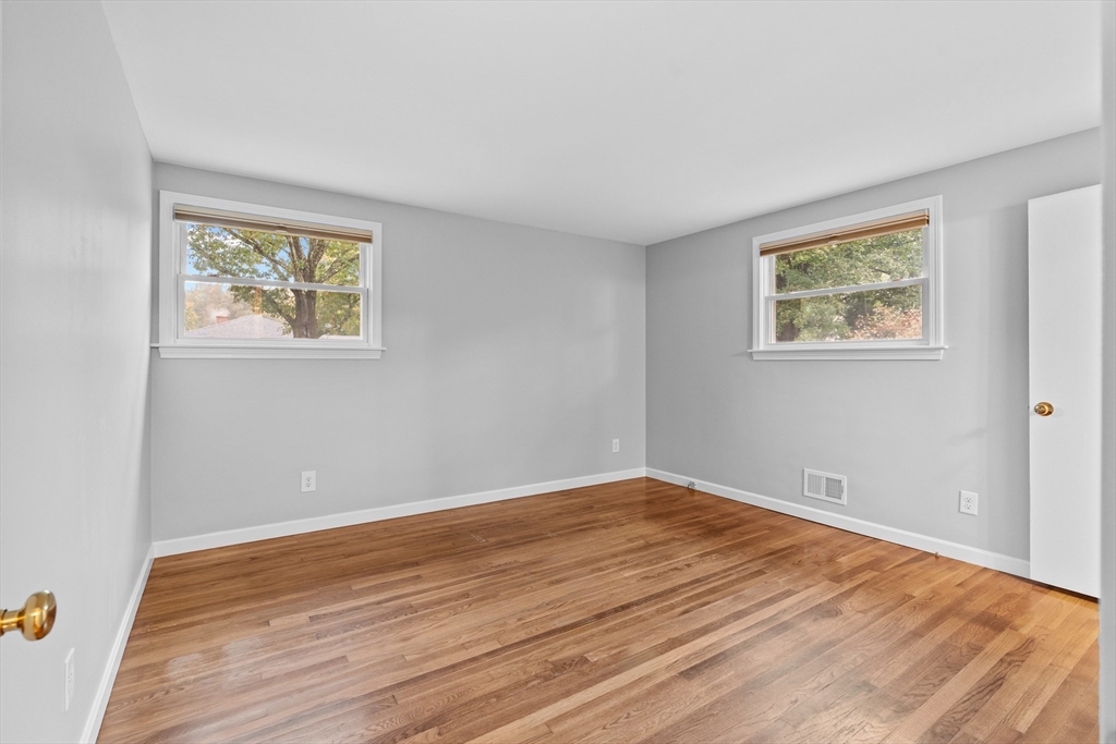5 Janice Circle Framingham, MA 01701 - Photo 16 of 36 a view of room with window and wooden floor