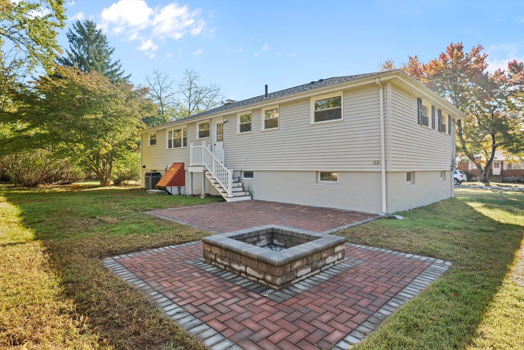 5 Janice Circle Framingham, MA 01701 - Photo 27 of 36 a view of a small house in the background