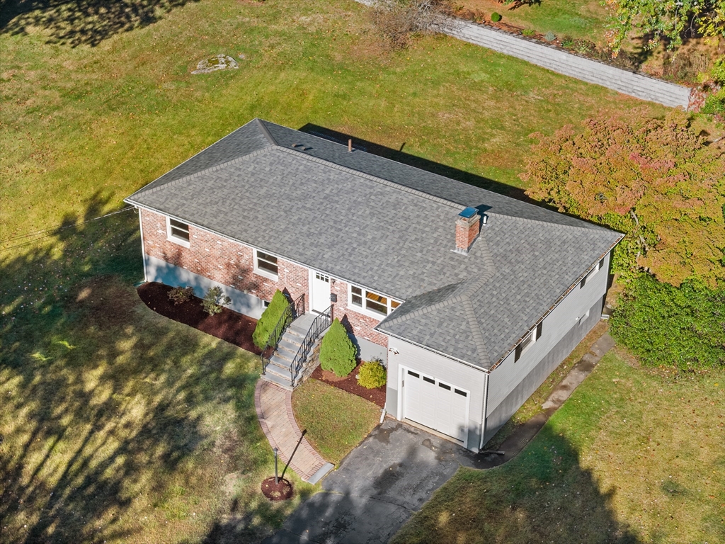 5 Janice Circle Framingham, MA 01701 - Photo 30 of 36 a aerial view of a house with a yard and large tree