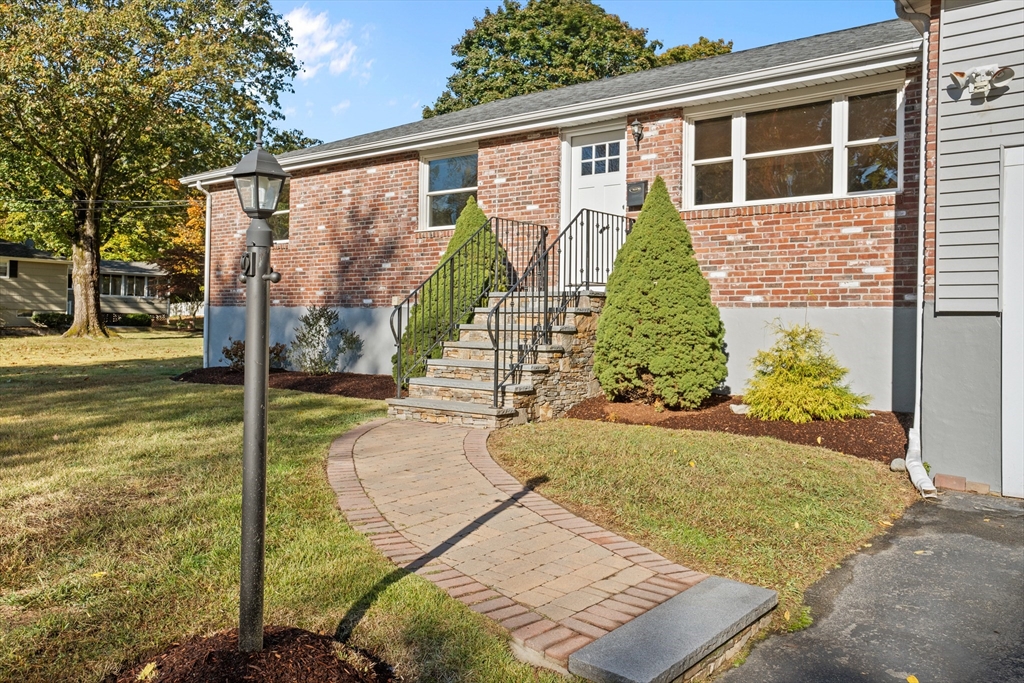 5 Janice Circle Framingham, MA 01701 - Photo 4 of 36 a view of a house with backyard