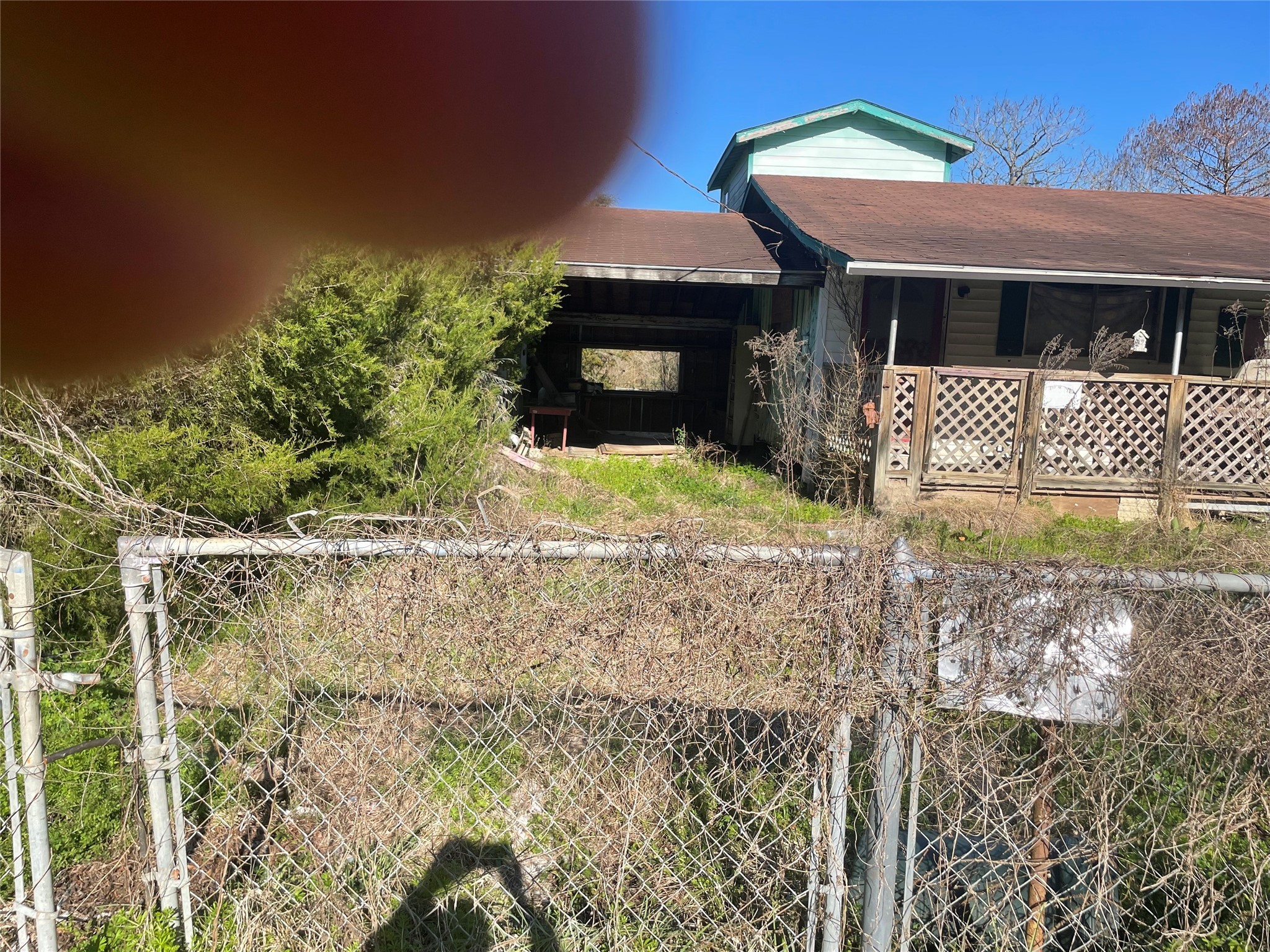 113 2901st Road Cleveland, TX 77327 - Photo 3 of 6 a front view of a house with a yard