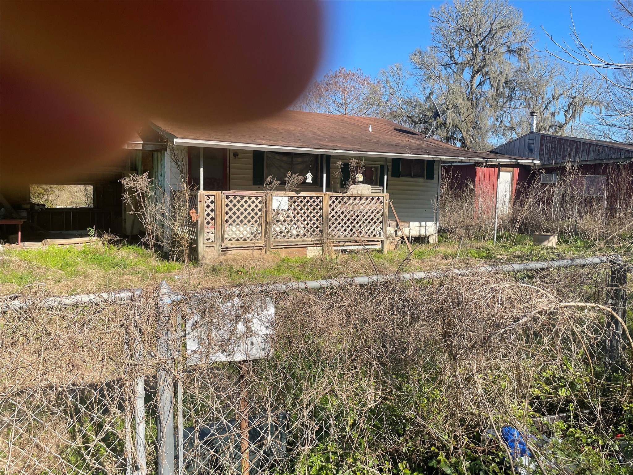 113 2901st Road Cleveland, TX 77327 - Photo 5 of 6 a front view of a house with garden
