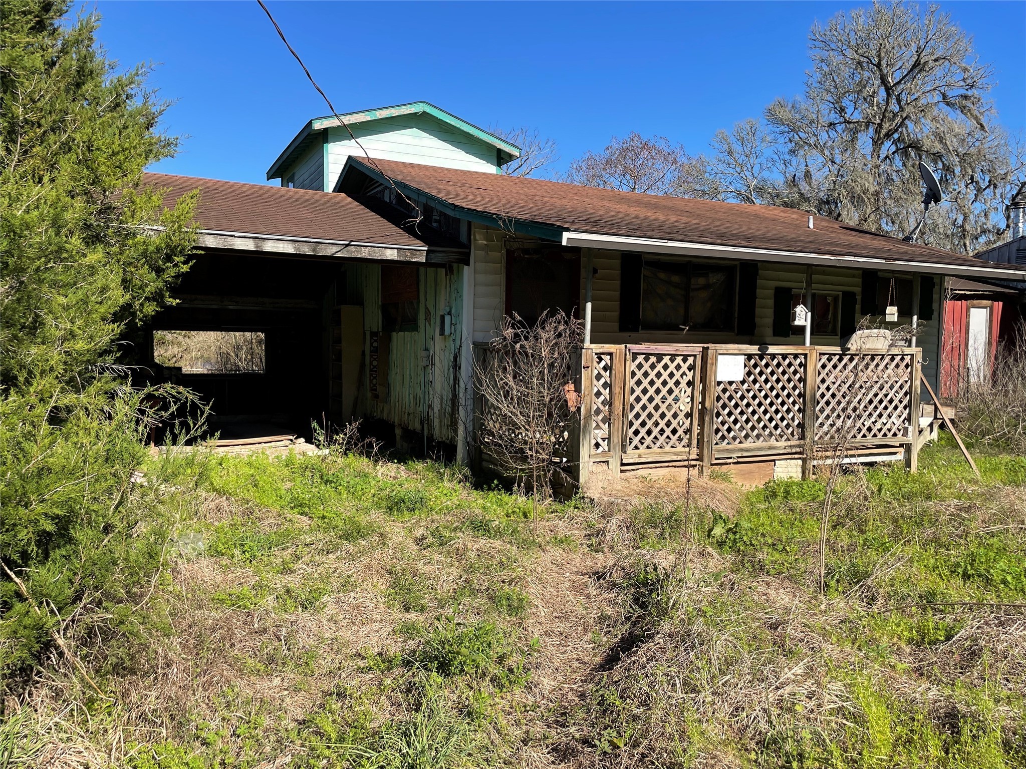 113 2901st Road Cleveland, TX 77327 - Photo 6 of 6 a front view of a house with a yard