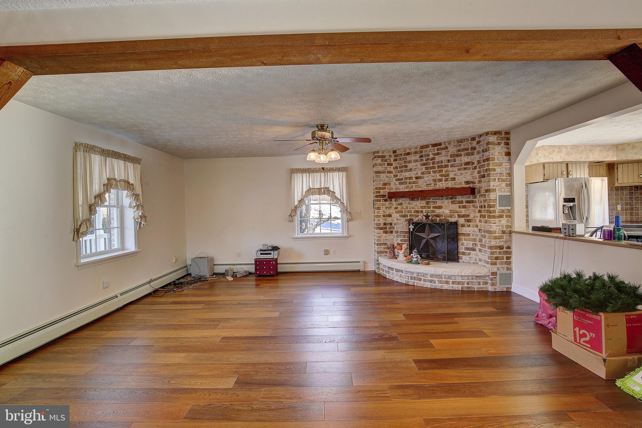 241 Earth Station Road Catawissa, PA 17820 - Photo 10 of 18 a view of an empty room and fire place