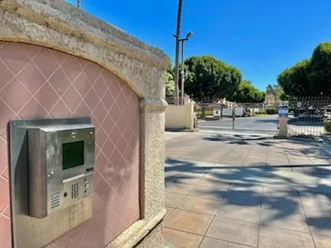view of a dry yard with wooden fence