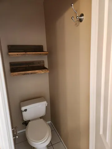 a bathroom with a toilet