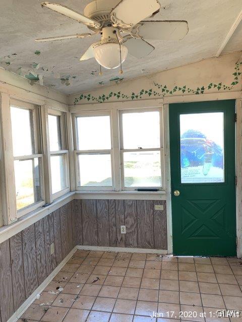 611 Fairgrounds Road Gilbert, PA 18331 - Photo 3 of 10 a view of an empty room with a window