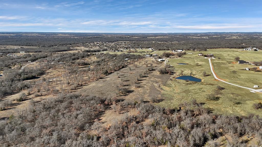 1802 Hlavek Road Decatur, TX 76234 - Photo 2 of 4 an aerial view of residential building and ocean