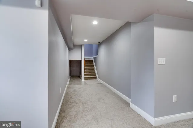 a view of a house with trees in the house