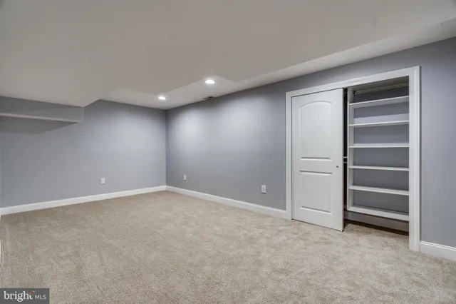 a view of a house with pool and a yard