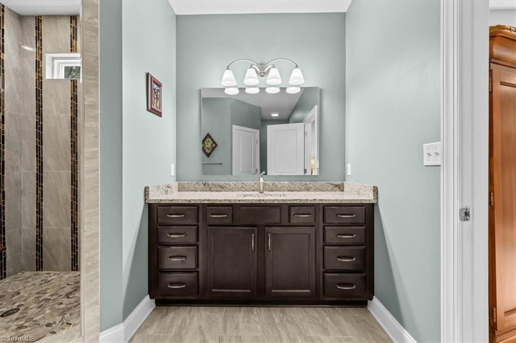 7355 Pisgah Covered Bridge Road, Unit 1 Troy, NC 27371 - Photo 20 of 50 Primary en suite with custom shower