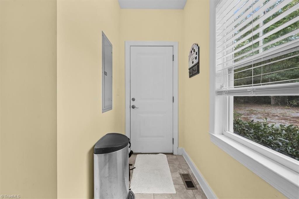7355 Pisgah Covered Bridge Road, Unit 1 Troy, NC 27371 - Photo 34 of 50 Laundry room with exterior access