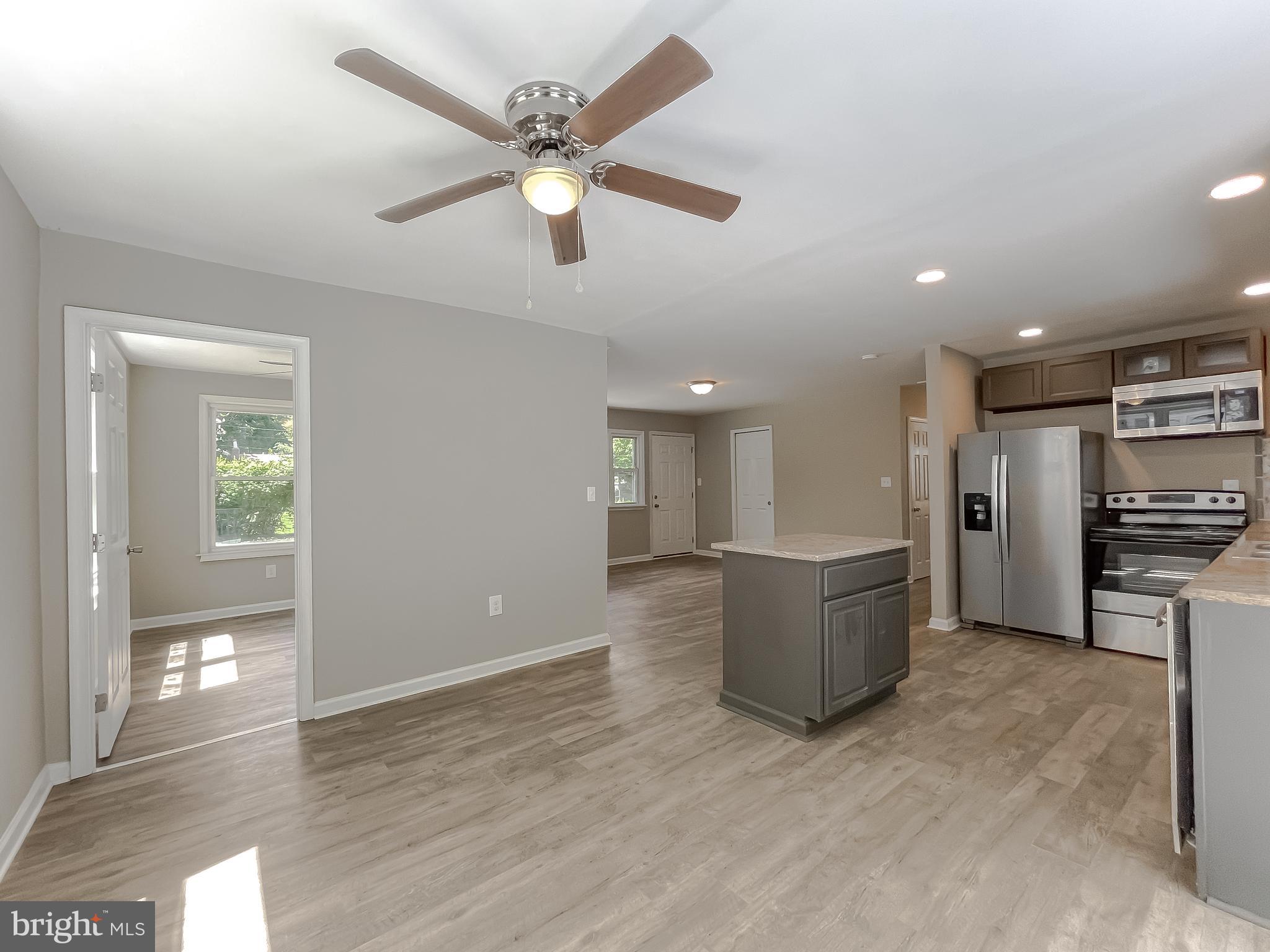 1607 Beech Road St. Leonard, MD 20685 - Photo 17 of 33 a living room with furniture and kitchen view