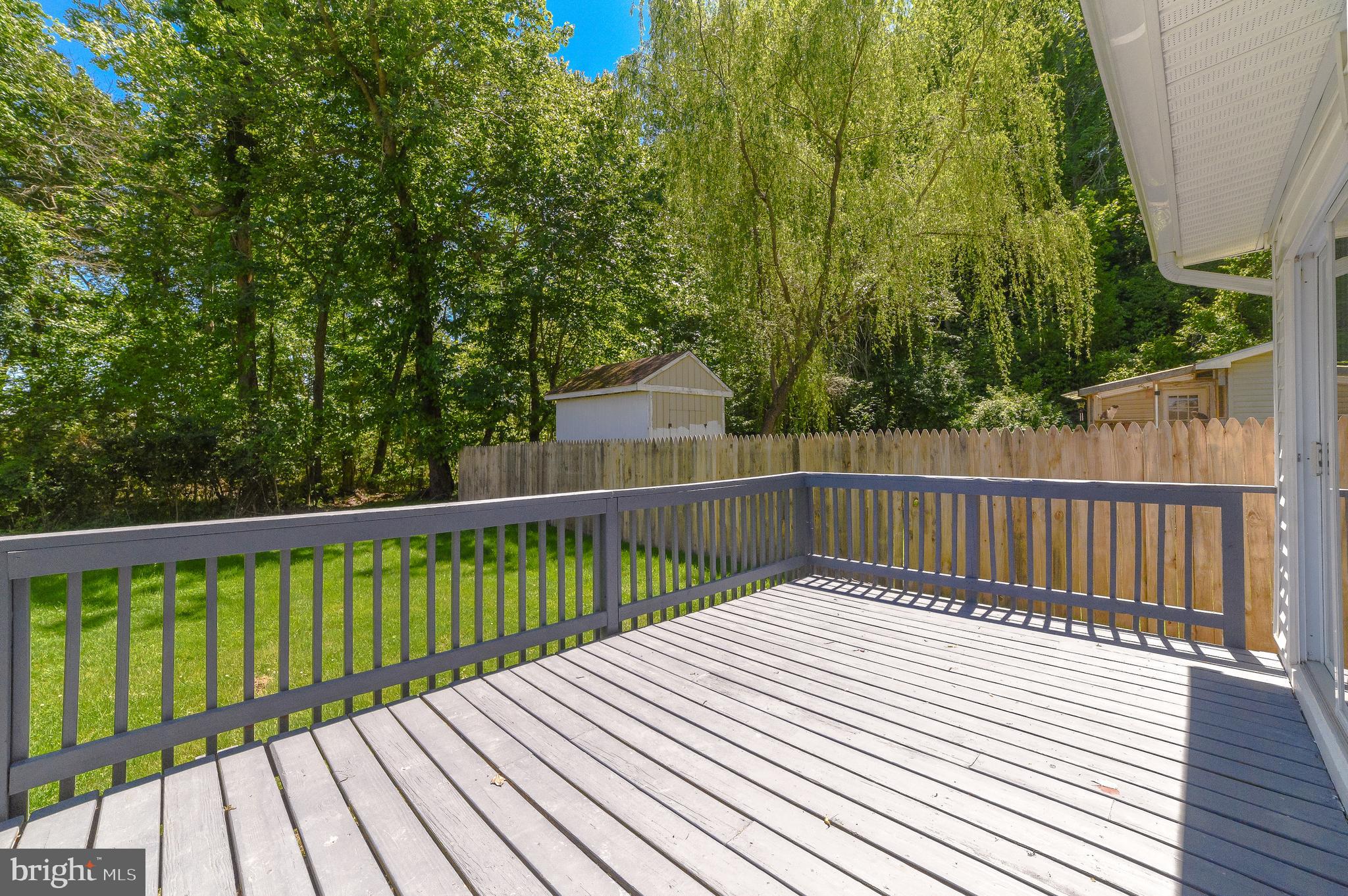 1607 Beech Road St. Leonard, MD 20685 - Photo 5 of 33 a view of balcony with wooden floor and fence