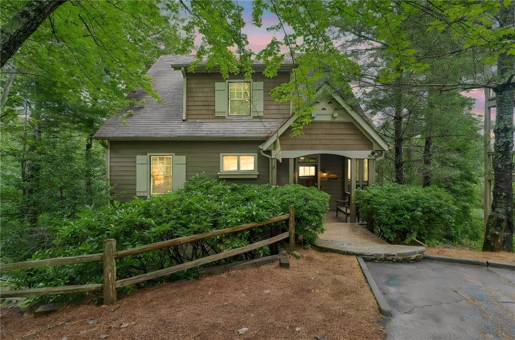 14 Laurel Ridge Lane Big Canoe, GA 30143 - Photo 1 of 72 a front view of a house with a yard
