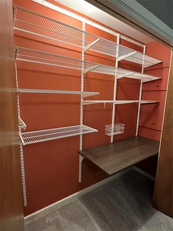a view of a room with racks on the wall