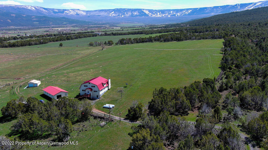 47417 KE Road Mesa, CO 81643 - Photo 18 of 40 a view of a lake with a mountain in the background