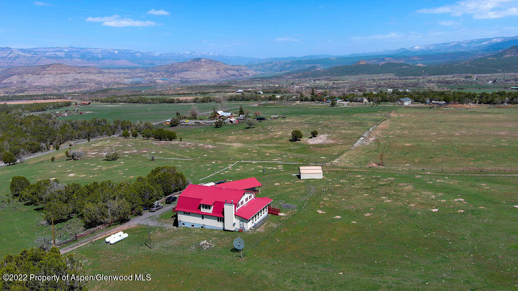 47417 KE Road Mesa, CO 81643 - Photo 27 of 40 a view of a lake with a mountain in the background