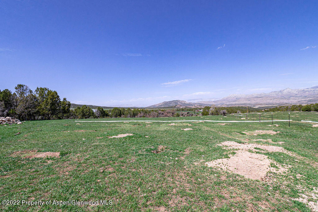 47417 KE Road Mesa, CO 81643 - Photo 30 of 40 a view of a field with an ocean