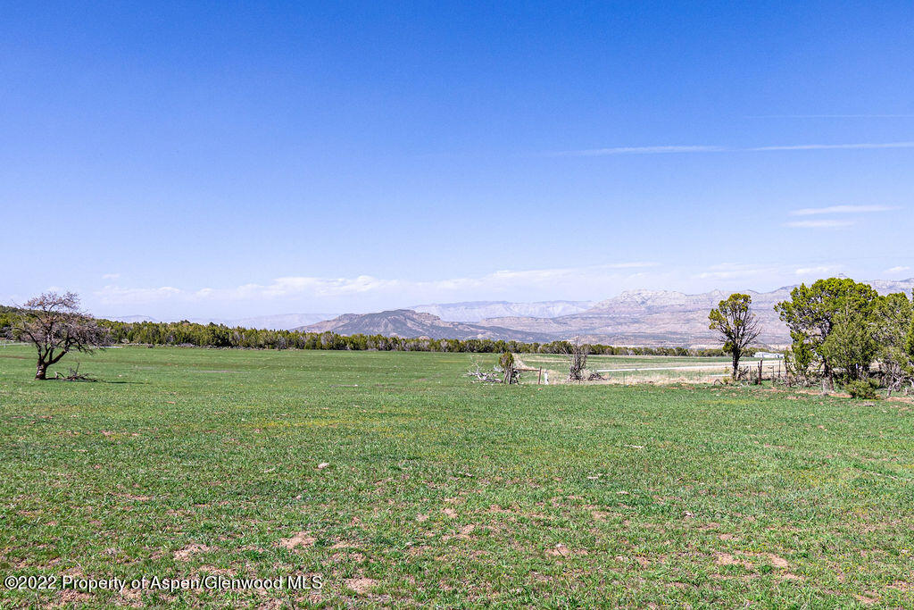 47417 KE Road Mesa, CO 81643 - Photo 34 of 40 a view of a lake with a mountain