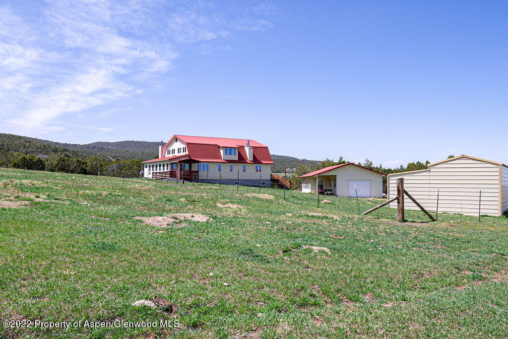 47417 KE Road Mesa, CO 81643 - Photo 40 of 40 a house view with a garden space